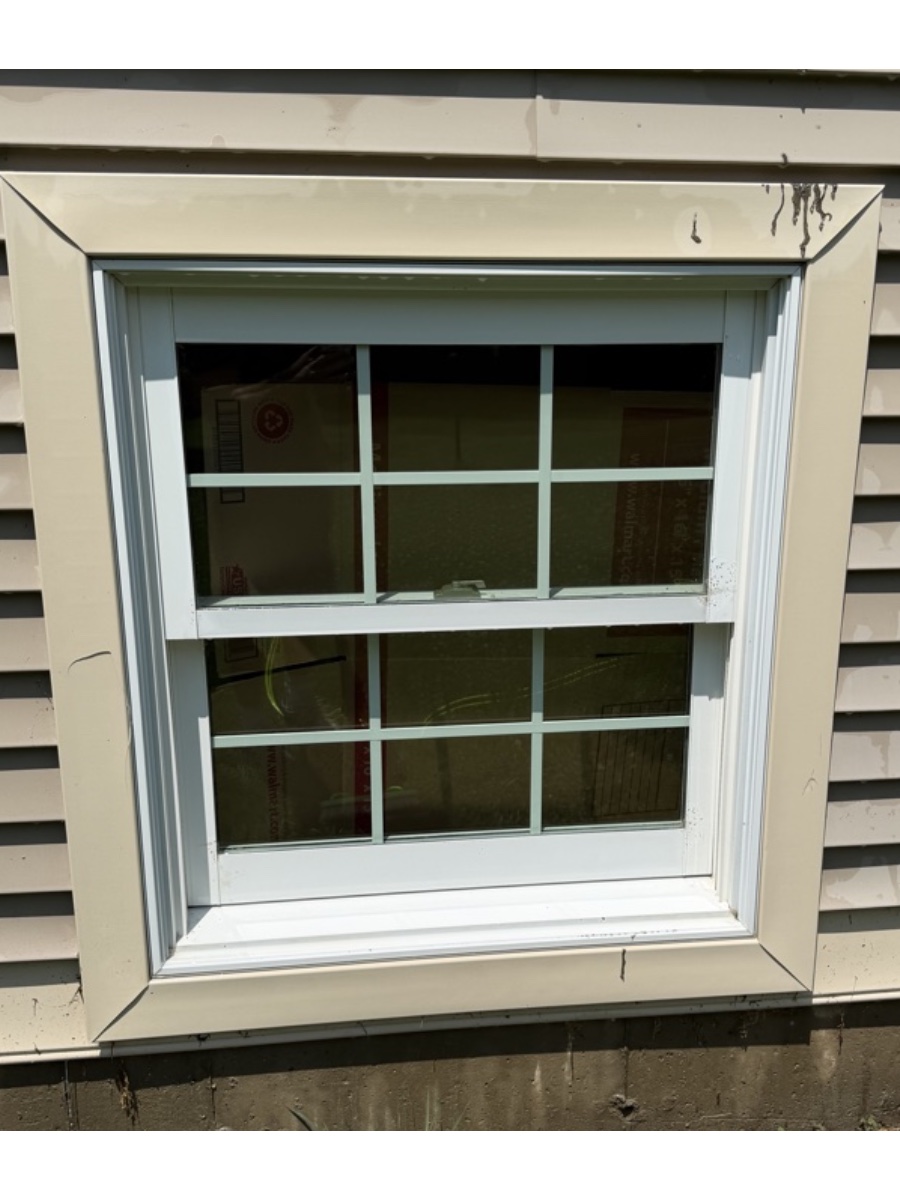 Window frame, sill and glass after a full detail clean by Clear View Window Co.