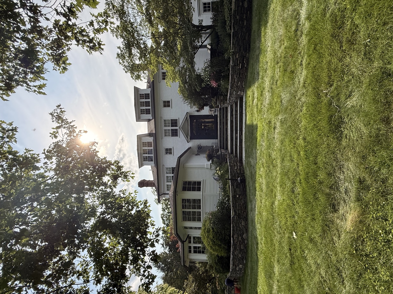 White colonial home with freshly cleaned windows by Clear View, Connecticut