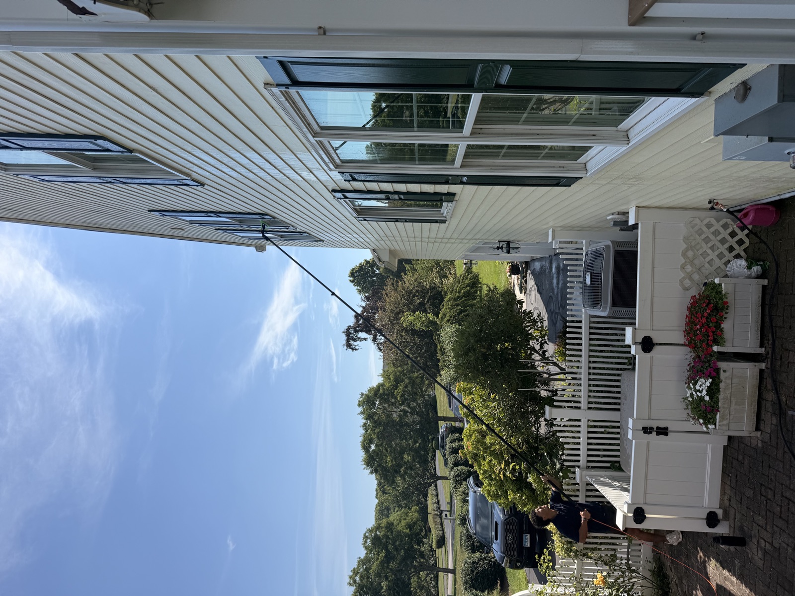 Clear View crew cleaning the side windows of a Connecticut home