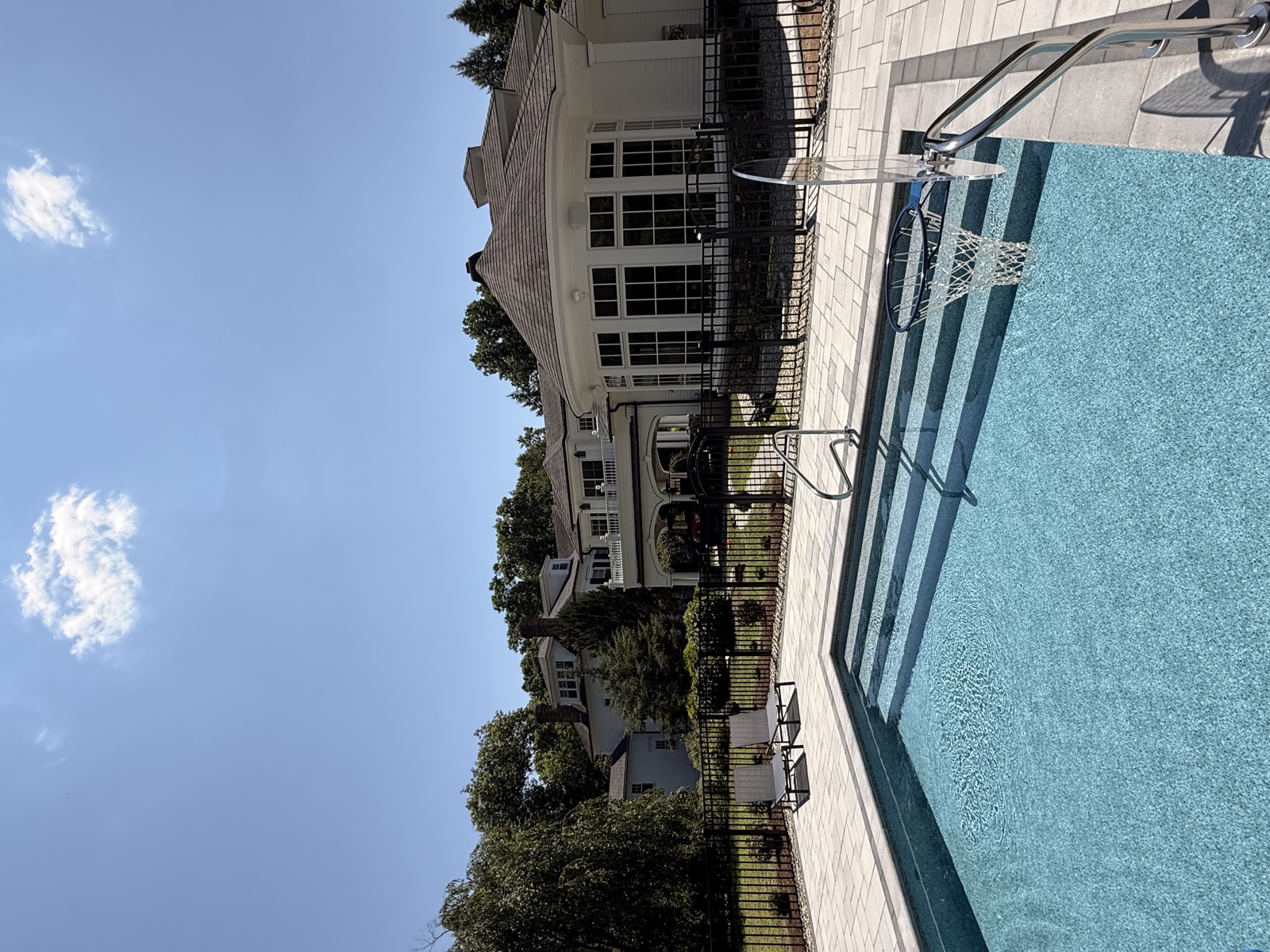 Poolside estate with freshly cleaned exterior windows by Clear View, Connecticut