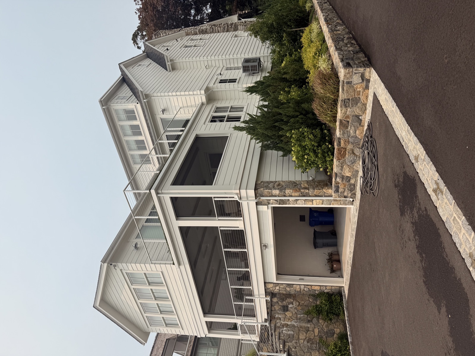 White coastal Connecticut home with freshly cleaned windows by Clear View