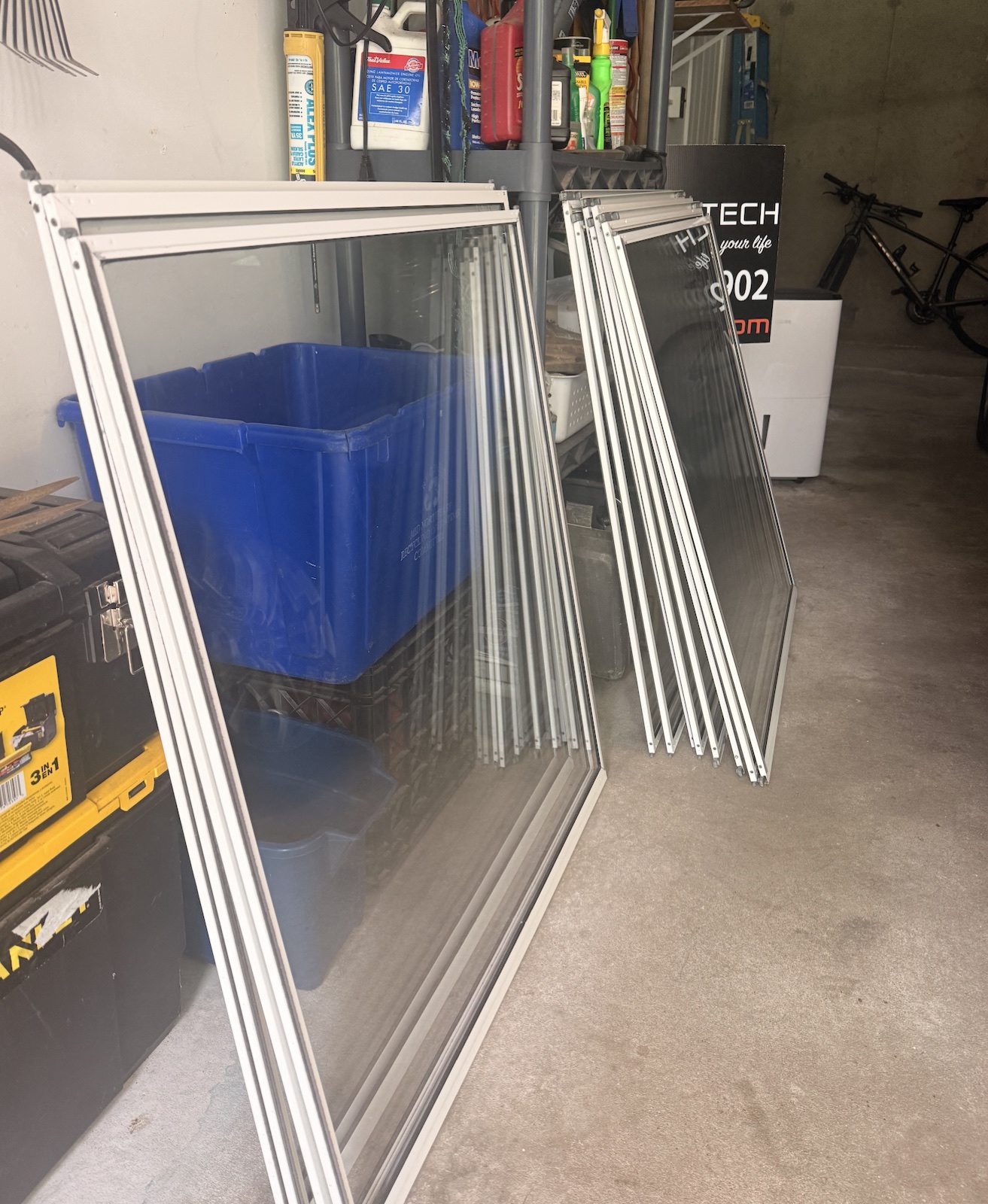 Triple-track storm window panels removed for cleaning by Clear View, Connecticut